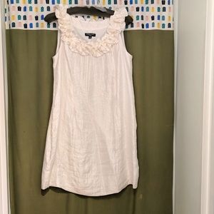 Stunning crinkle shiny taffeta-like flattering ruffle neckline, darts flatter